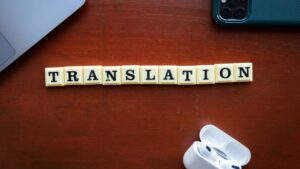 Photo showing little letter cubes forming the word "translation"